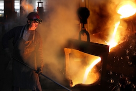 Man Manufacturing Alnico Magnets Using Typical Foundry Casting Techniques